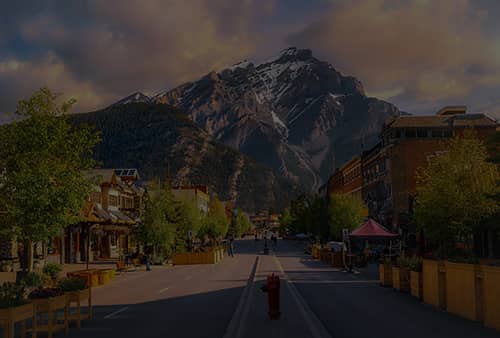 CAPS Community, Alberta Chapter; image of Banff with mountains in background