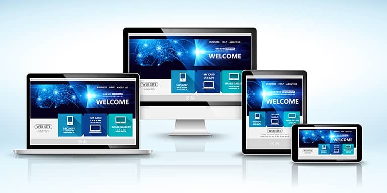 Website launch; mockup of a desktop, laptop, tablet and mobile device displaying a website